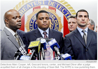 Detectives Marc Cooper, left, Gescard Isnora, center, and Michael Oliver after a judge acquitted them of all charges in the shooting of Sean Bell. The NYPD is now punishing them.